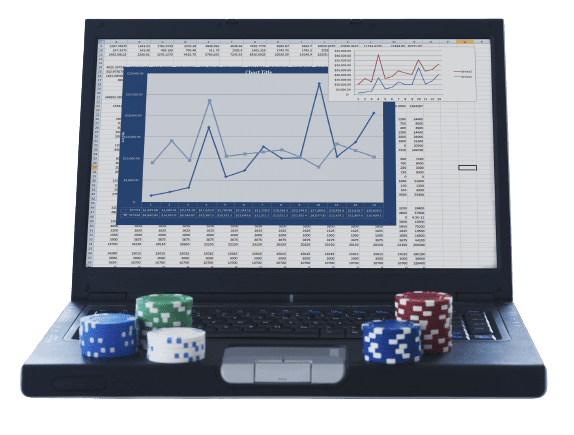 Stock market displayed on a laptop screen with casino chips on it